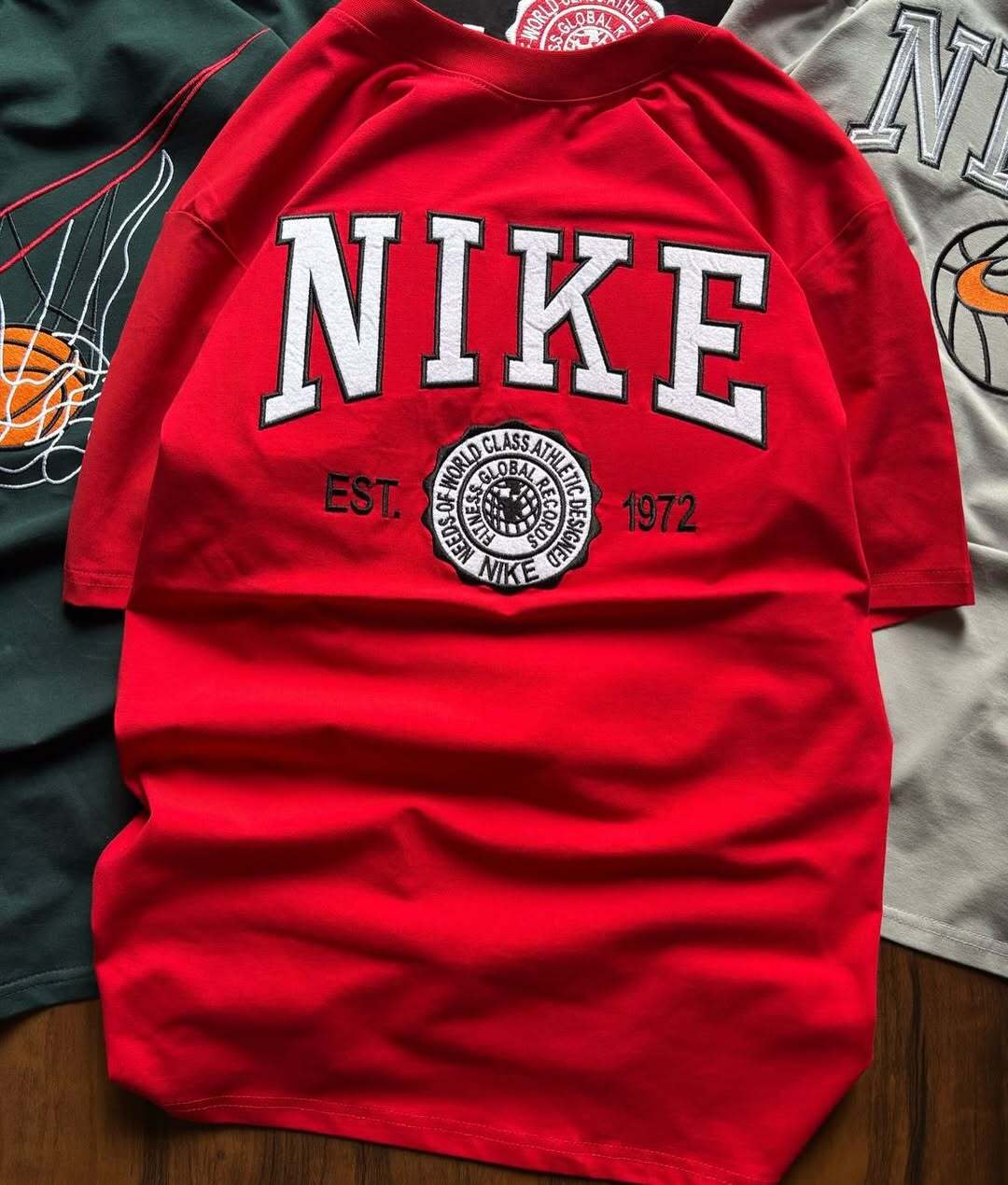 Nike Sportswear graphic t-shirt featuring a "NIKE EST 1972" design on the chest (PACK OF 3)